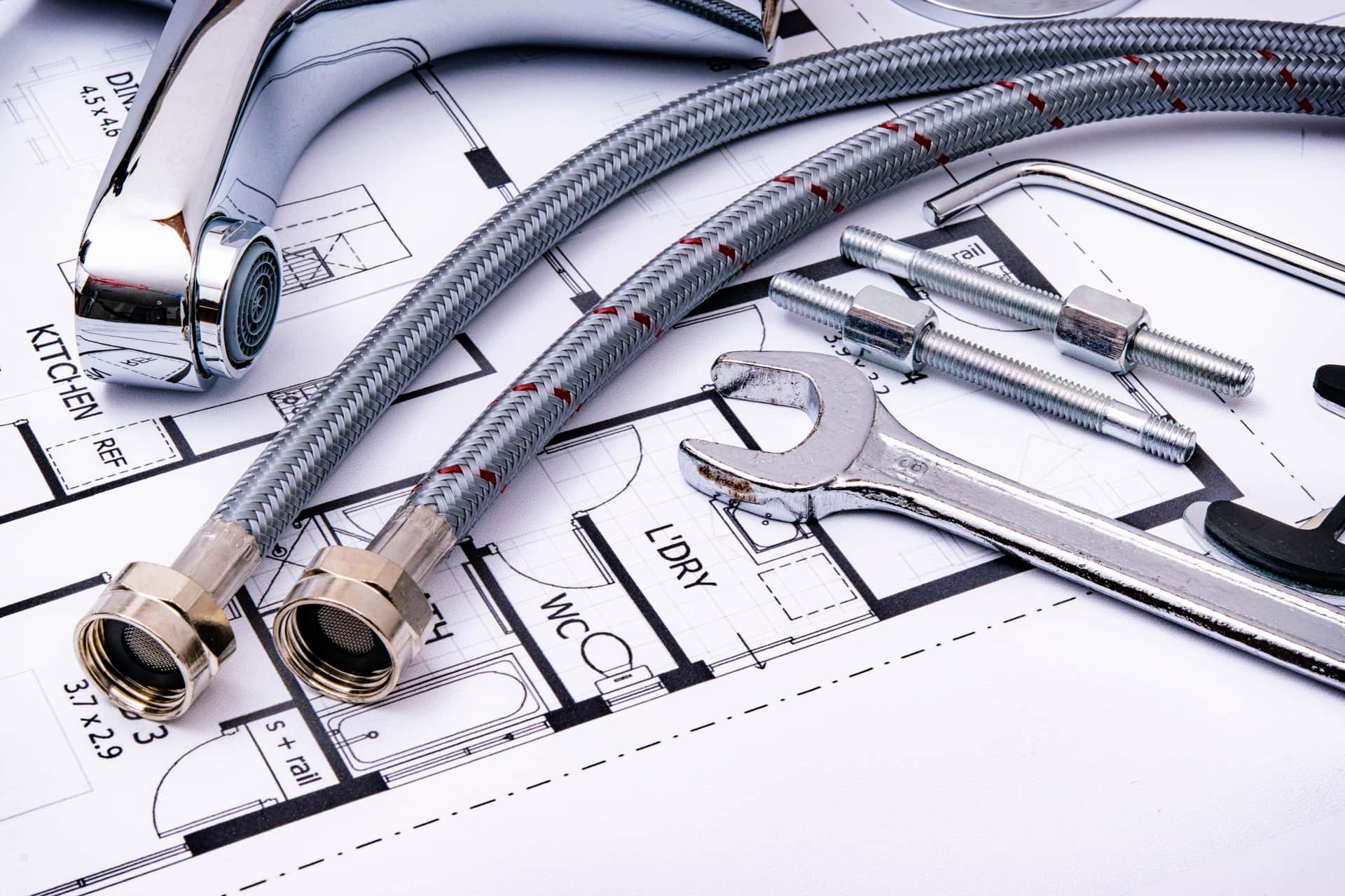 Plumbing tools ready for a repair