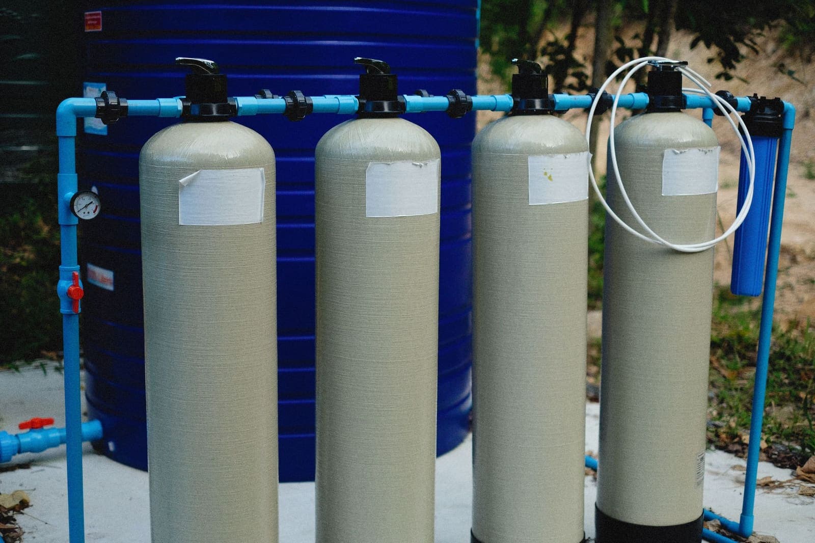 Treatment tanks and blue piping in a water treatment installation